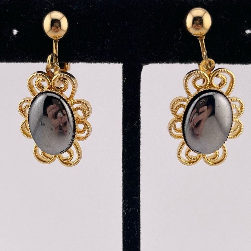 Vintage hematite filigree clip on earrings gold tone